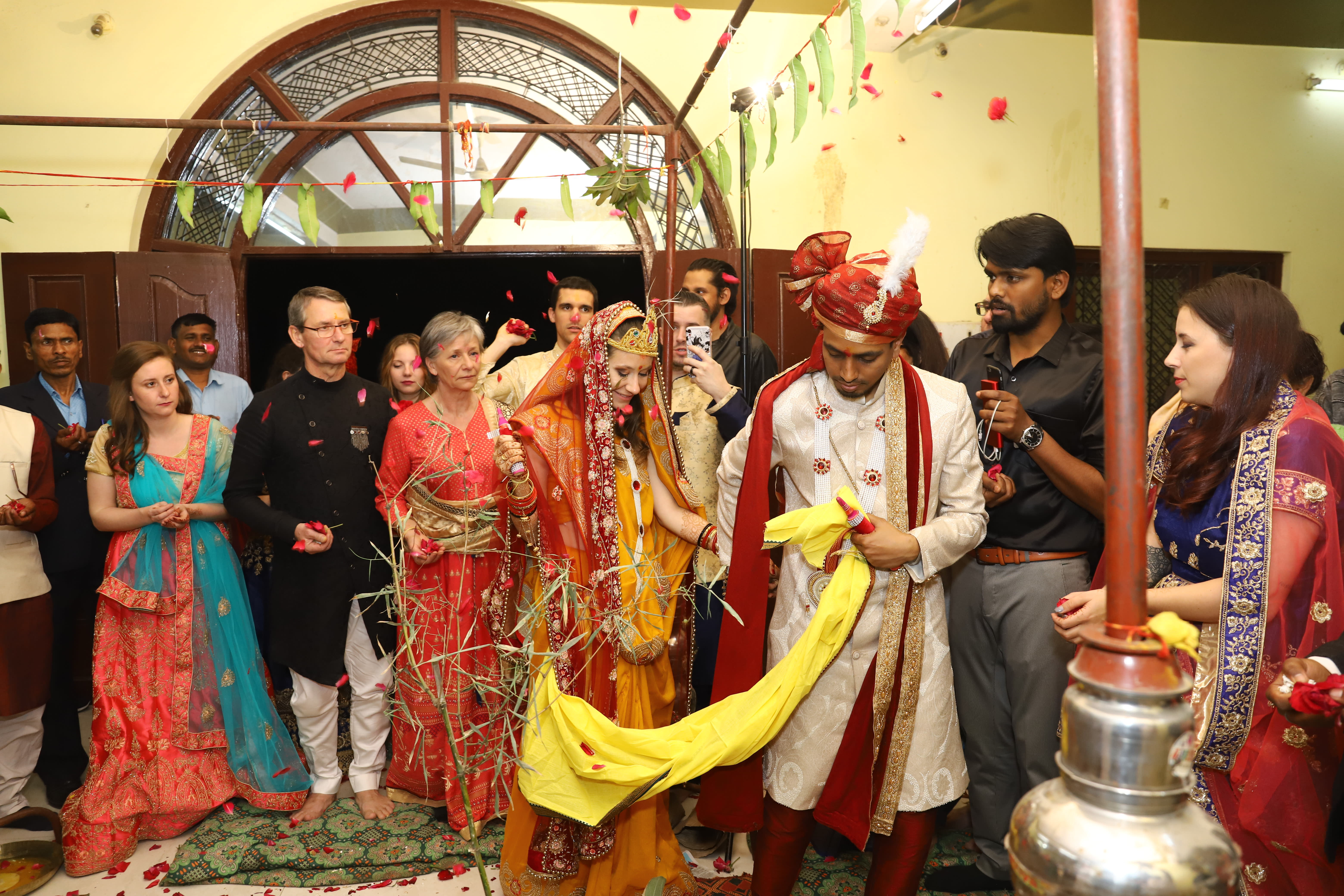 bride and groom doing phera indian ritual