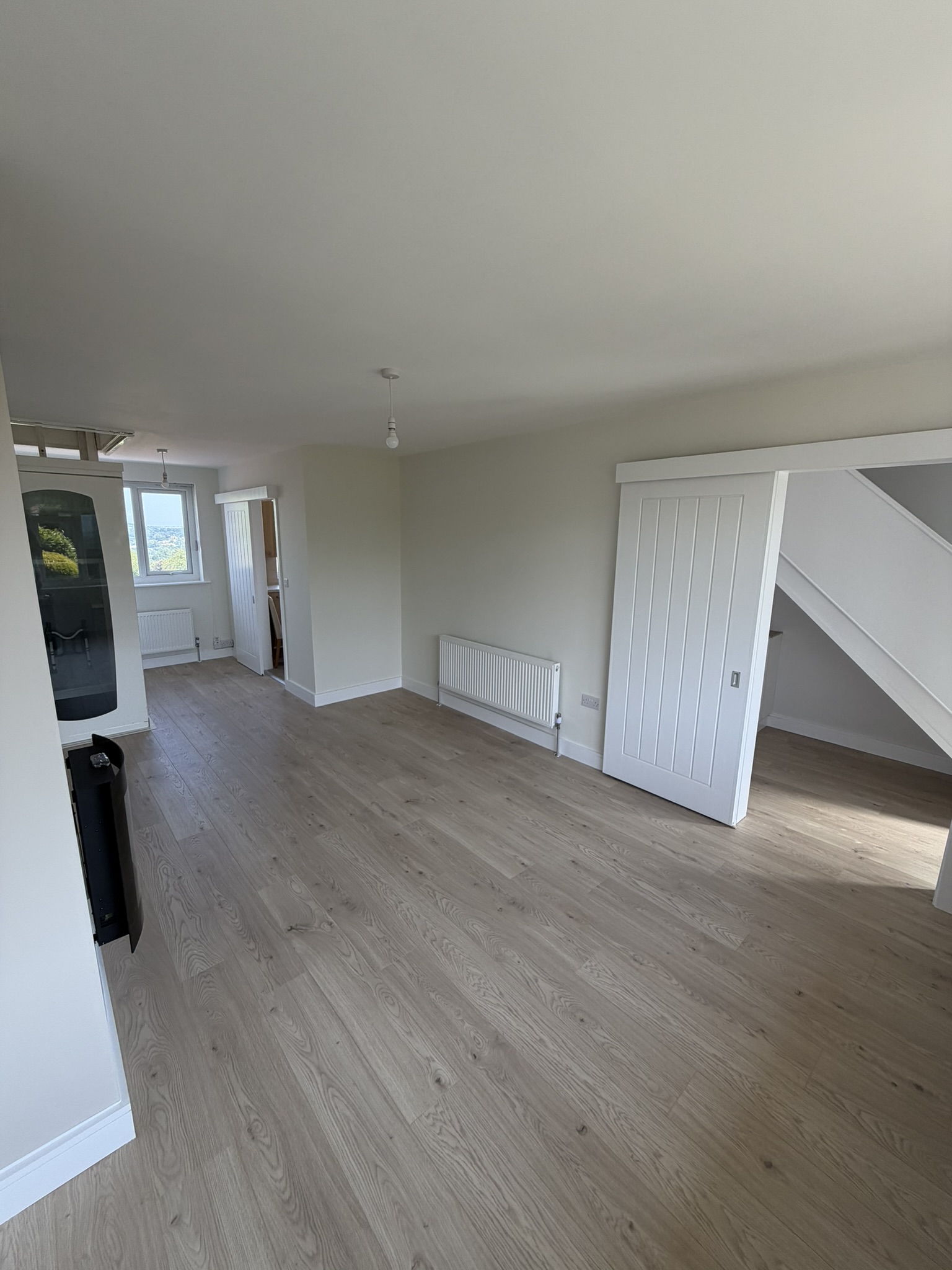 Reception room with sliding doors to hall and kitchen accessible property to rent Bolton Lancashire AccessiblePRS