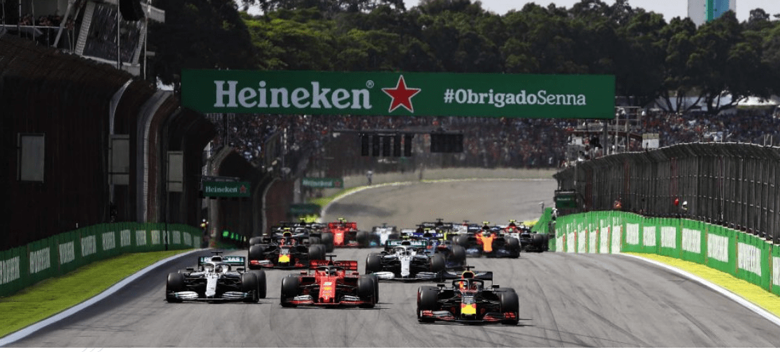 The cars sprint down to the first of the 'Senna S' corners at the start of the 2019 Brazilian Grand Prix