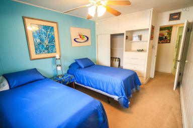air conditioned second bedroom with 2 twin beds