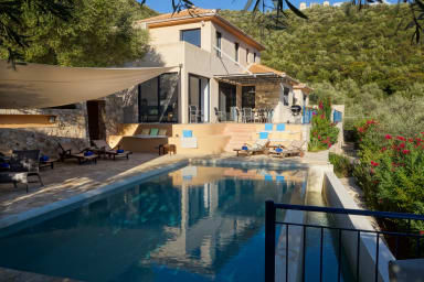 large terrace south and west around the pool
