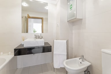 Bathroom with bathtub.