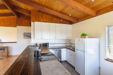 Fridge, drawers, oven, microwave, dish washer, windows , cutting board