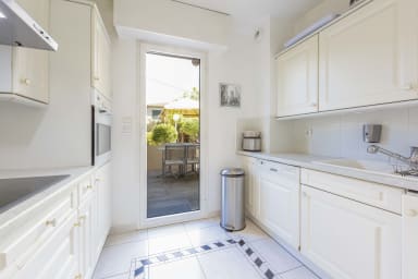 fully fitted kitchen open on the north terrace