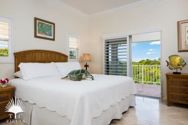 Master suite #1 with access to balcony.