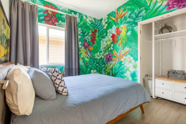The floral room with a queen size bed