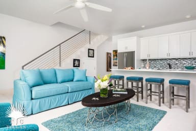 Sandpiper's comfortable living room and fully equipped kitchen.