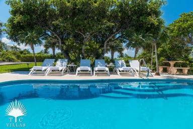 Reef Pearl's private pool with loungers.