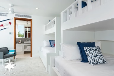 Lower-level double bunk beds room.