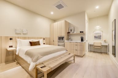 Queen-size bed, sleeps 2, and  Sony Smart TV