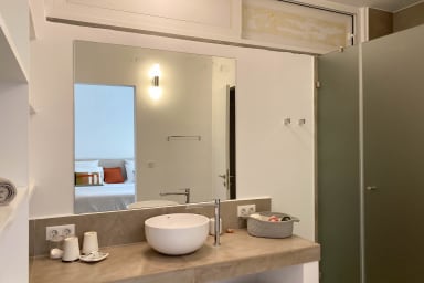 bathroom private with toilettes and shower