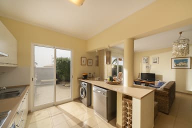 Kitchen and livingroom witch tv