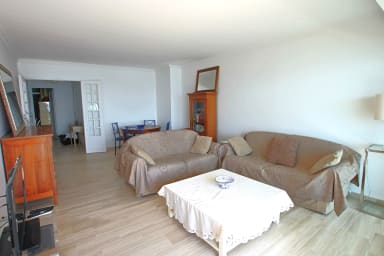 large living room with lounge area, TV,WIFI, dining table