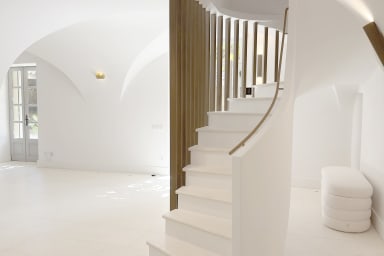 The staircase leading to the upstairs bedrooms
