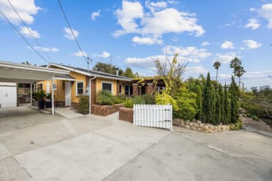 View from the driveway of the front of the home.