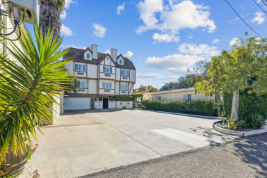 There are nine guest parking spaces located behind the property. 