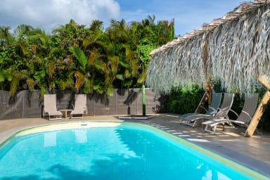 Photo de Bungalow en location saisonnière à Sainte-Anne en Guadeloupe 