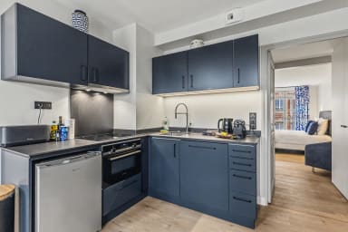 Cuisine compacte et fonctionnelle, parfaite pour de délicieux petits plats faits