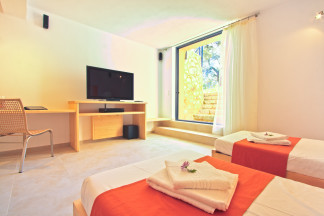 Spacious bedroom 3 with TV