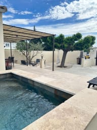 garden furniture outdoor dining area and swimming pool 