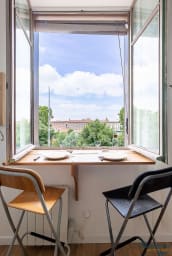 Small fold-down table for dining overlooking the quays of the Garonne
