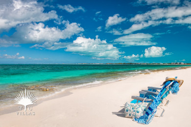 Coriander Cottage is 50 steps away from Grace Bay Beach.