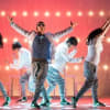 Daniel Uppal (centre) as Zain