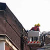 Firefighters inspect the damage on the Assembly Rooms car park roof