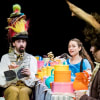 Alex Mugnaioni as The Mad Hatter, Rebecca Birch as Alice and Tom Connor as Mad March Hare