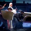 Gloria Onitiri (Cruella de Vil) and ensemble in The Hundred and One Dalmatians at Birmingham REP