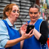 Tracy Gabbitas and Jennifer Banks as supermarket shelf stackers Tracey and Donna in Strife in a Northern Town