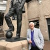Tom Kelly, writer of Bobby Robson Saved My Life, next to the statue of Sir Bobby Robson at St James’ Park, Newcastle