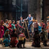 Adrian Dunbar as Fred Graham (centre) and company