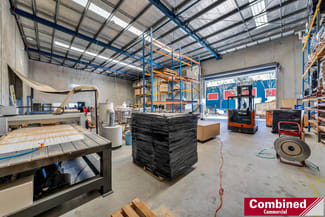 Factory, Warehouse & Industrial commercial property leased at 1/2-4 Gallipoli Street Smeaton Grange NSW 2567