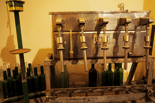 Historical Wine Equipment Display at Akafuku Wine Cellar