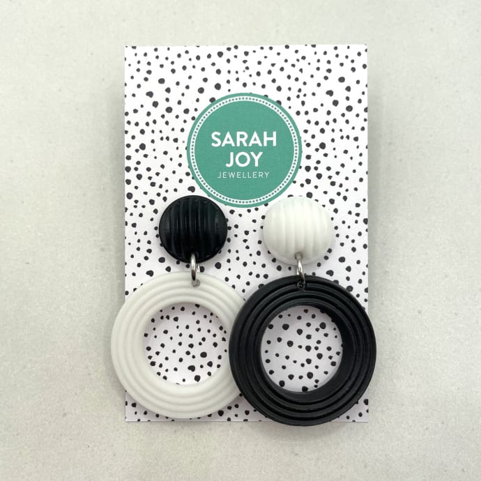 White / Black Mismatch Circle Studs: Quirky mismatch design 3D printed in lightweight resin. More colours available.