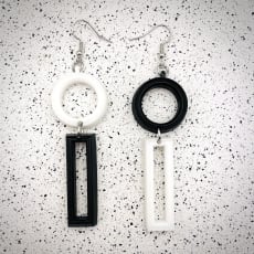 White / Black Mismatch Circle Earrings: Quirky mismatch design. Choose any two colours to create your perfect pair!