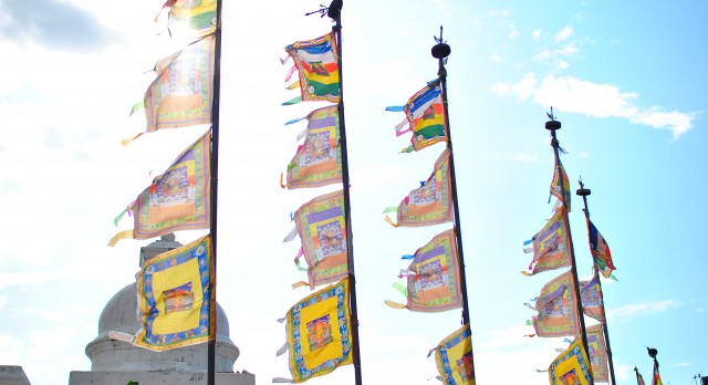 Flags fly high at the temple complex of Boudhanath in Nepal, Asia