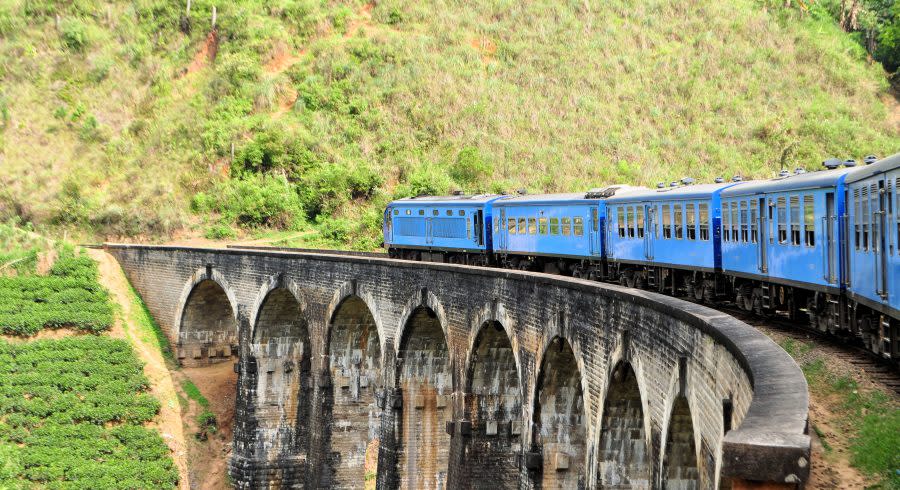 Train on bridge in hill country of Sri Lanka