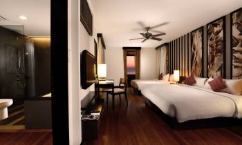 a bedroom with a large bed in a room