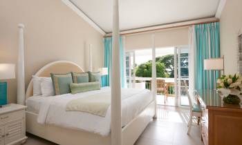 a bedroom with a large bed in a room