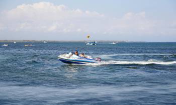 a small boat in a body of water