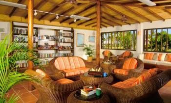 a room filled with furniture and a table