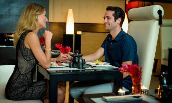 a man and a woman sitting at a table