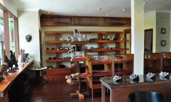 a living room filled with furniture and a fireplace