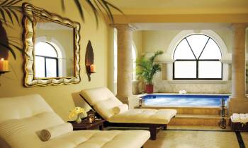 a living room with a large mirror