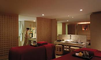 a bedroom with a large window
