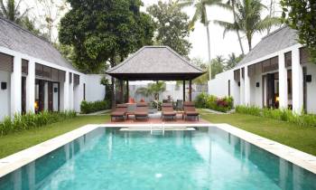 a small house in a pool of water