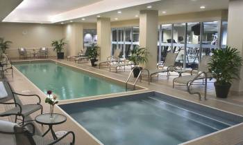 a room filled with furniture and a pool table