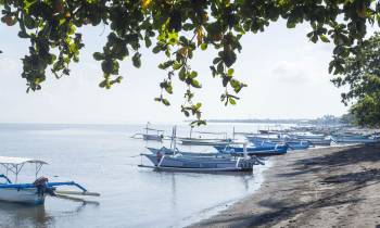 a small boat in a body of water